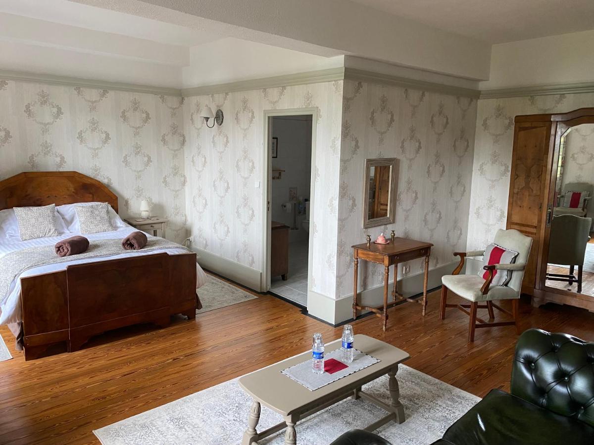 Le Logis Des Quatre Puits Panzió Neuvicq-Montguyon Kültér fotó